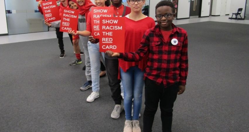 Students wear red to Show Racism The Red Card