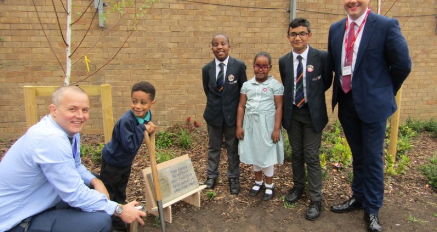 Pupils mark school's official opening by burying time capsule